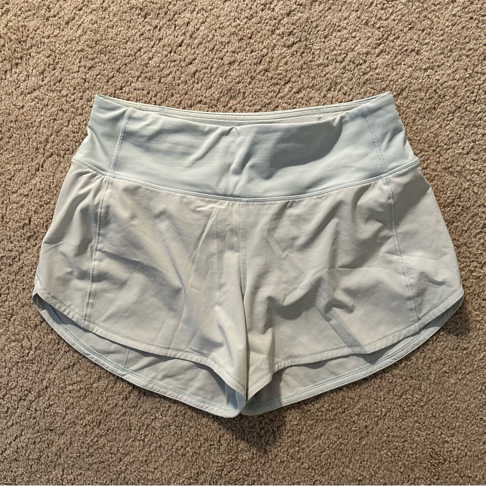 Lululemon Speed Up mid rise 4” shorts